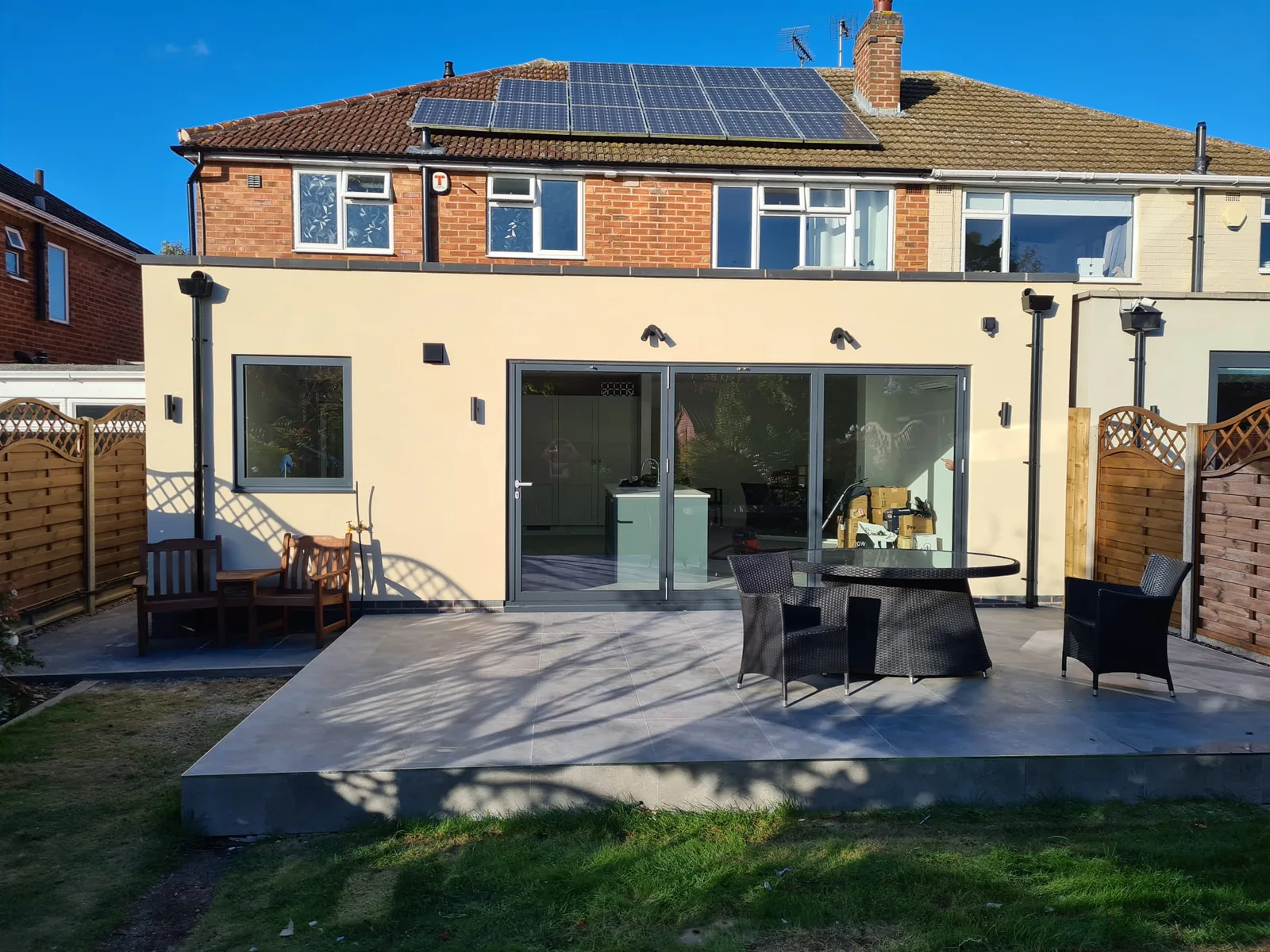 Completed rear extension with bi-fold doors and terrace