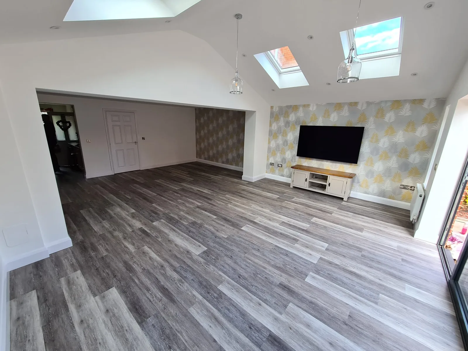 Completed refurbished living area with roof lights